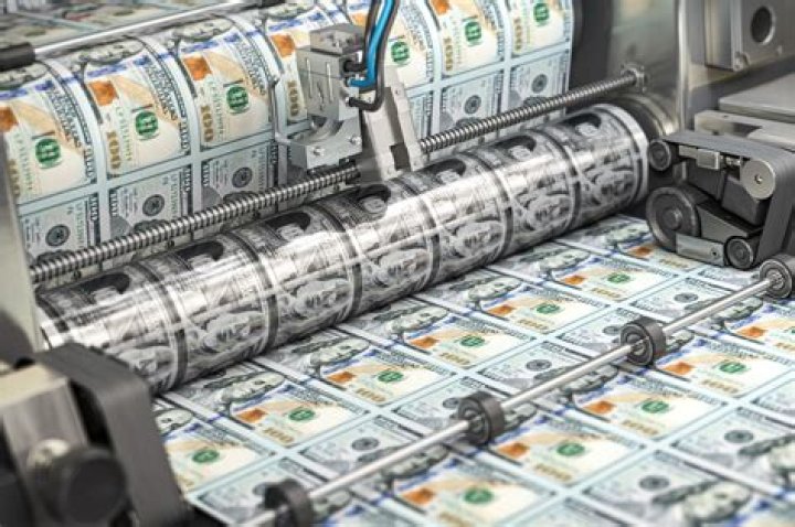 How does the government decide to print more money?